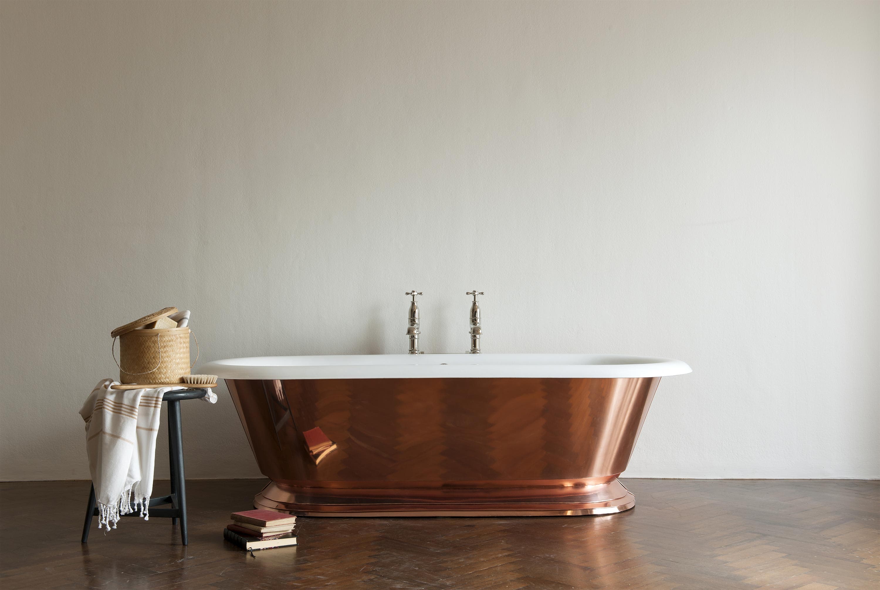 The Copper Tay cast iron skirted bath tub